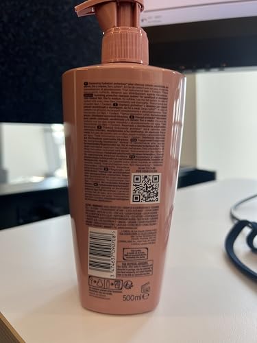 16.9 oz bottle on a shelf offering daily color protection with hydration.