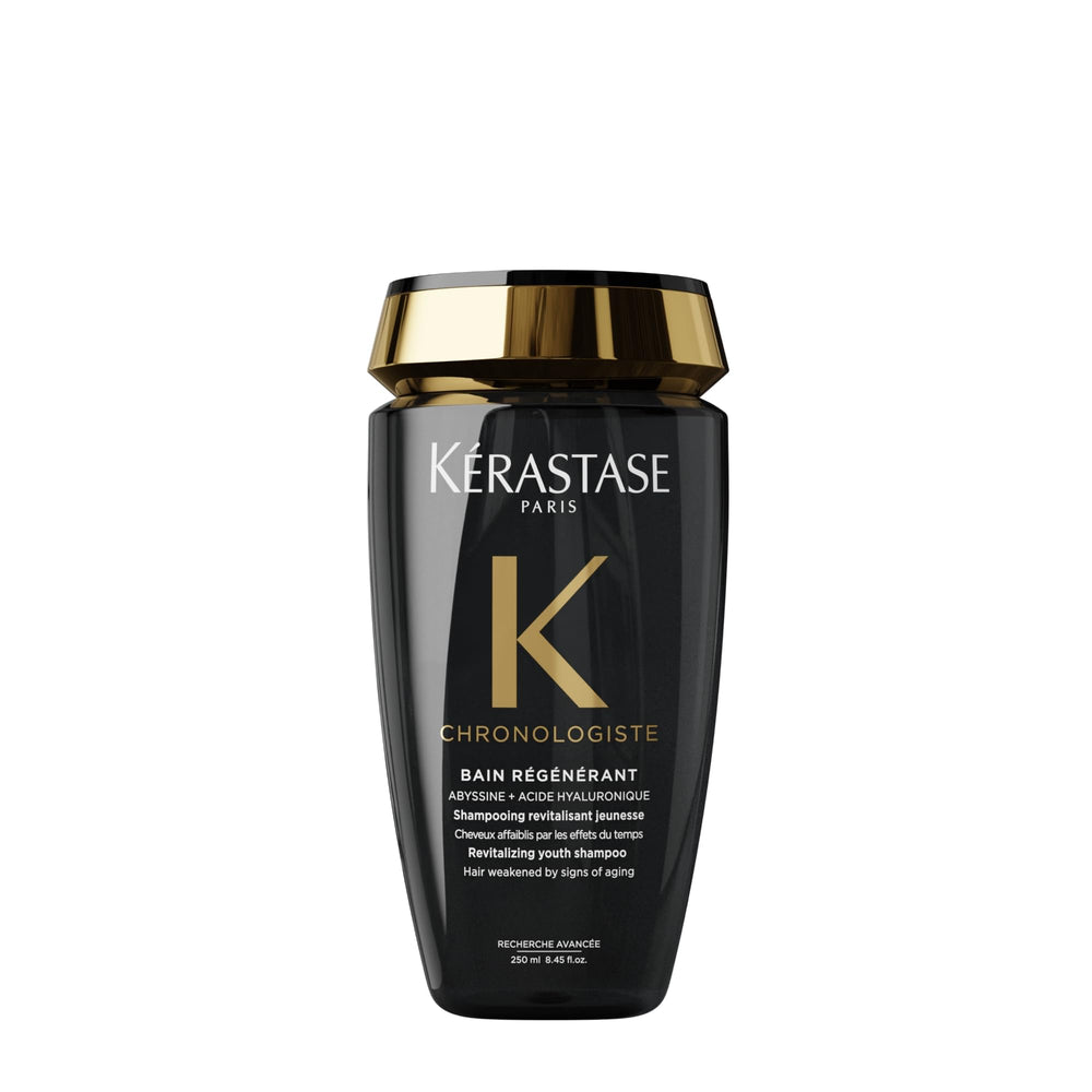 Kerastase Chronologiste Regenerant Shampoo bottle on shelf signaling hydration.