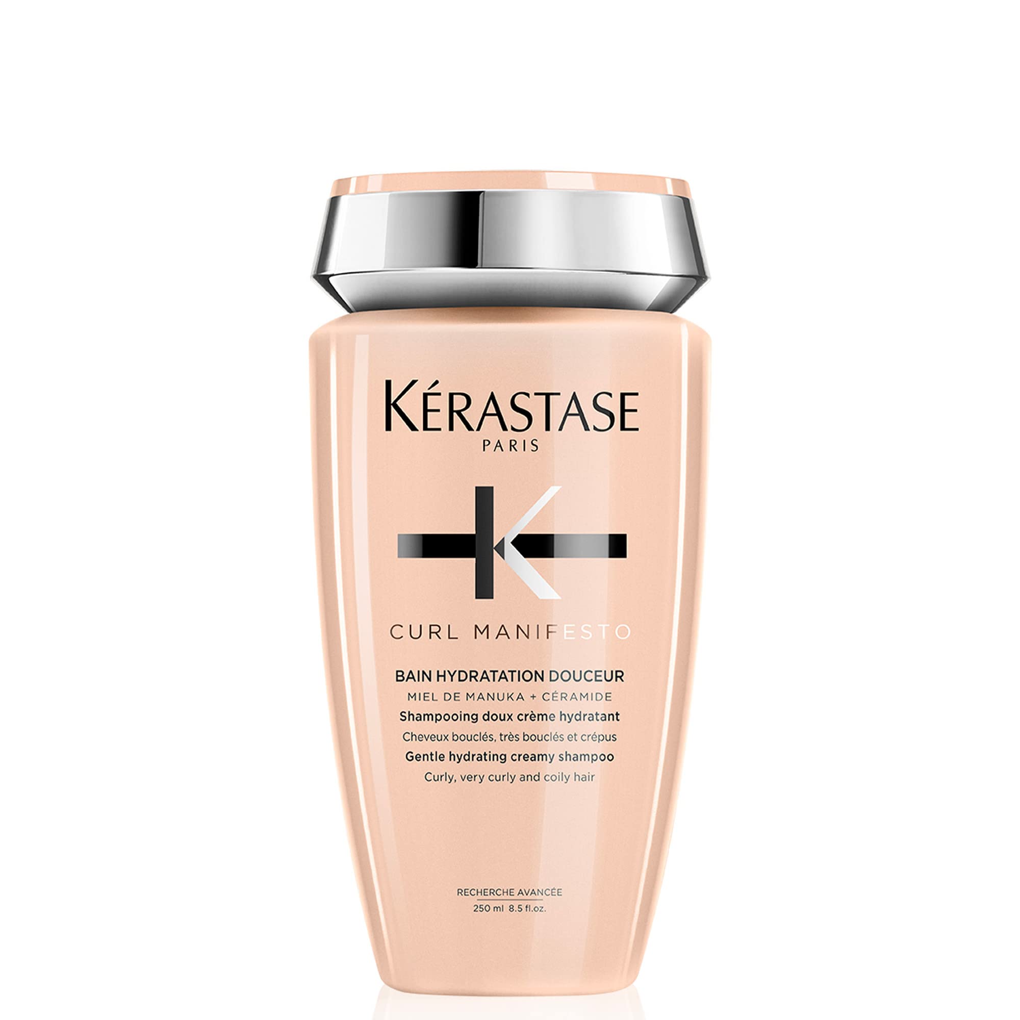 Kérasta­se Curl Manifesto hydration softness shampoo bottle promoting curl definition