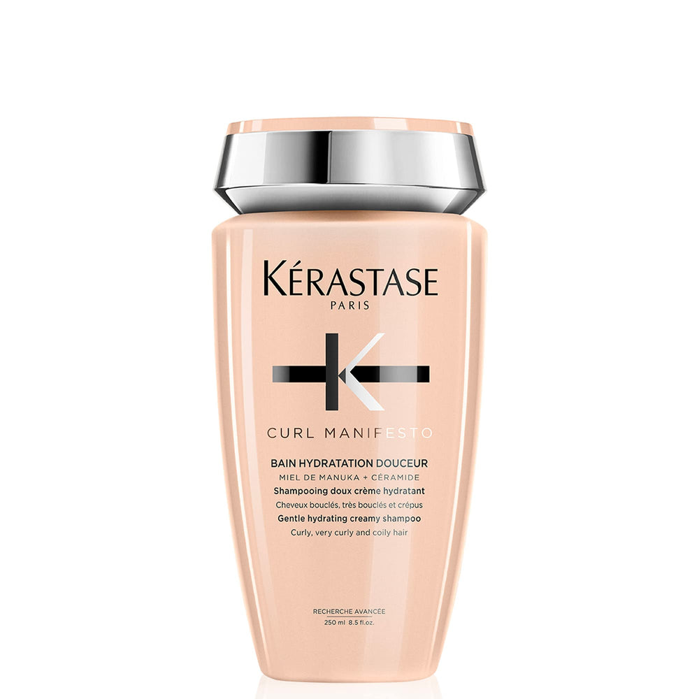 Kérasta­se Curl Manifesto hydration softness shampoo bottle promoting curl definition