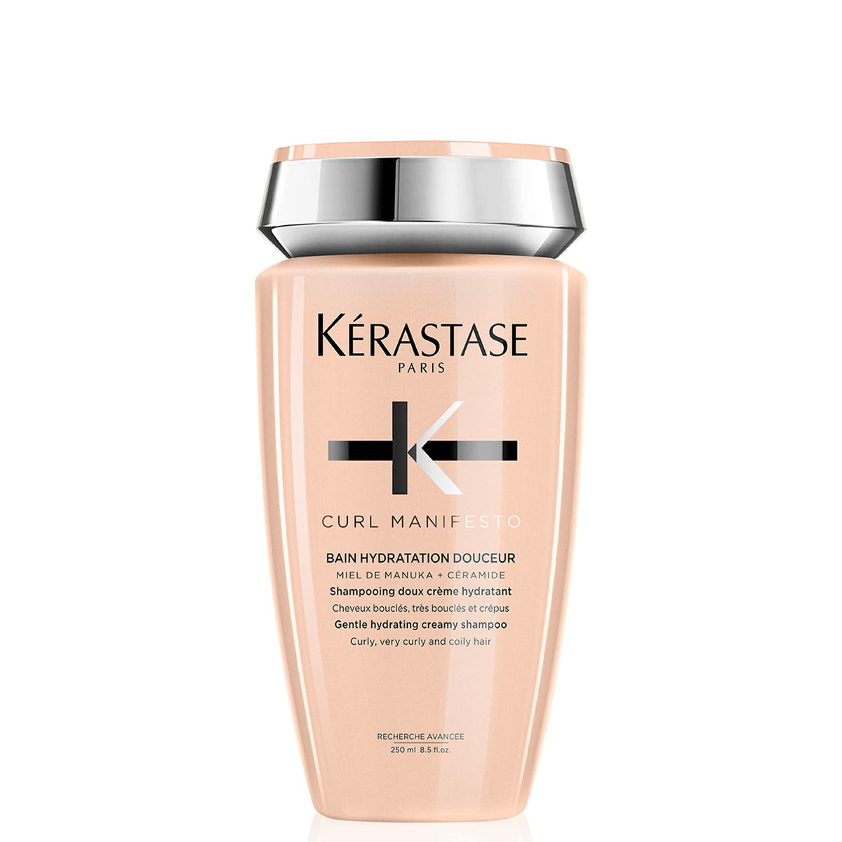 Kérasta­se Curl Manifesto hydration softness shampoo bottle promoting curl definition