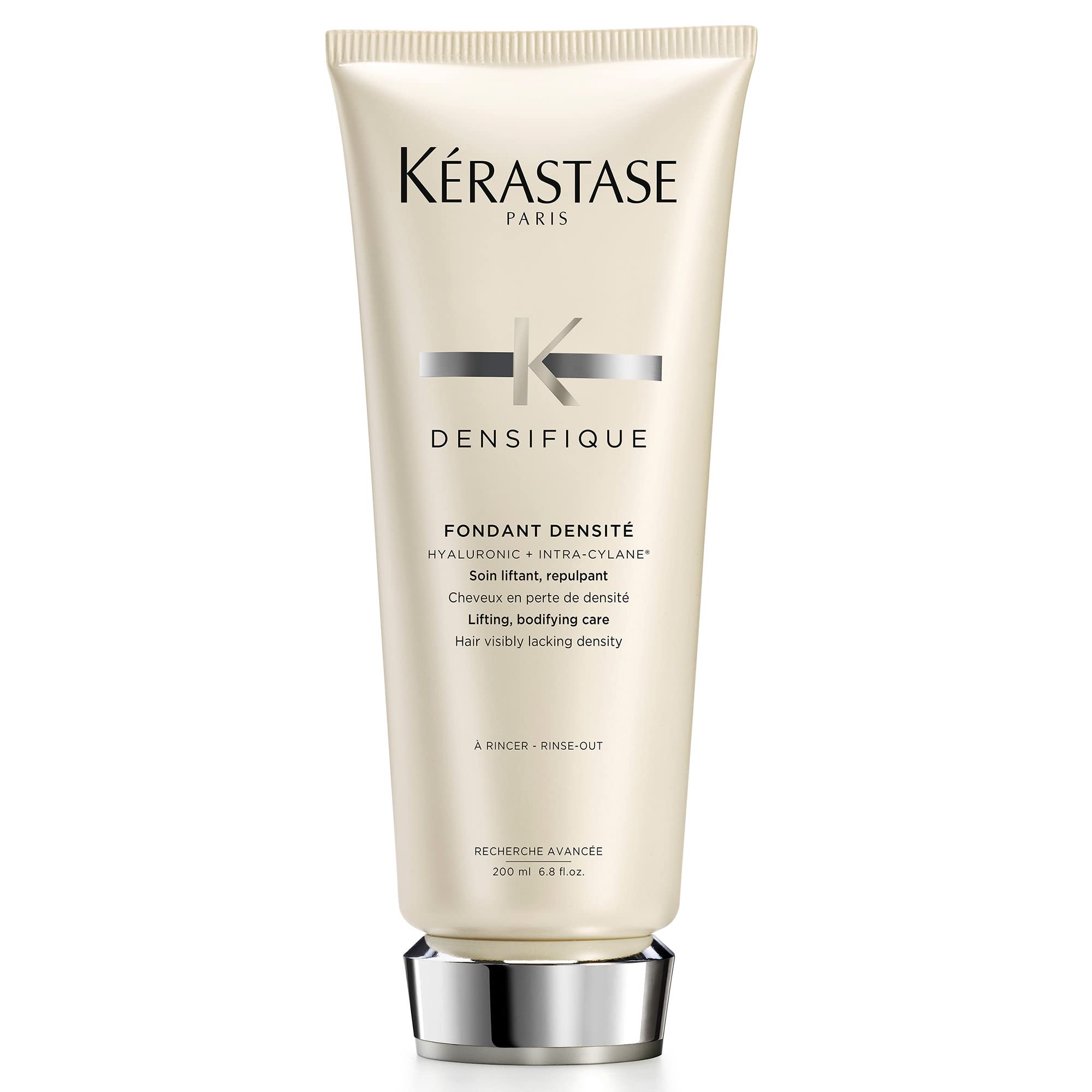 KÉRASTASE Densifique conditioner bottle highlighting premium packaging for fuller hair.
