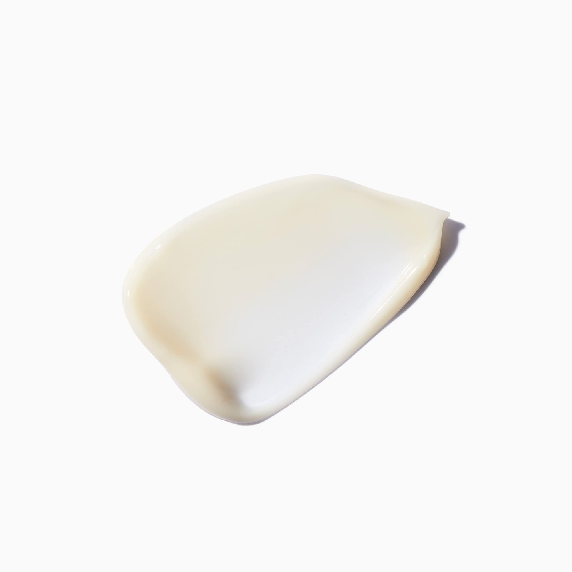 KÉRASTASE Densifique texture shot suggests lightweight, nourishing hydration.