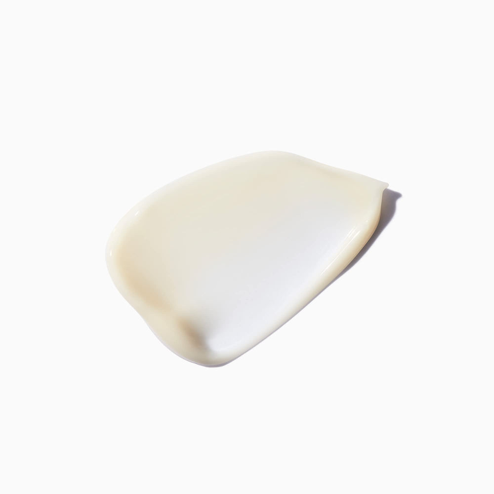 KÉRASTASE Densifique texture shot suggests lightweight, nourishing hydration.