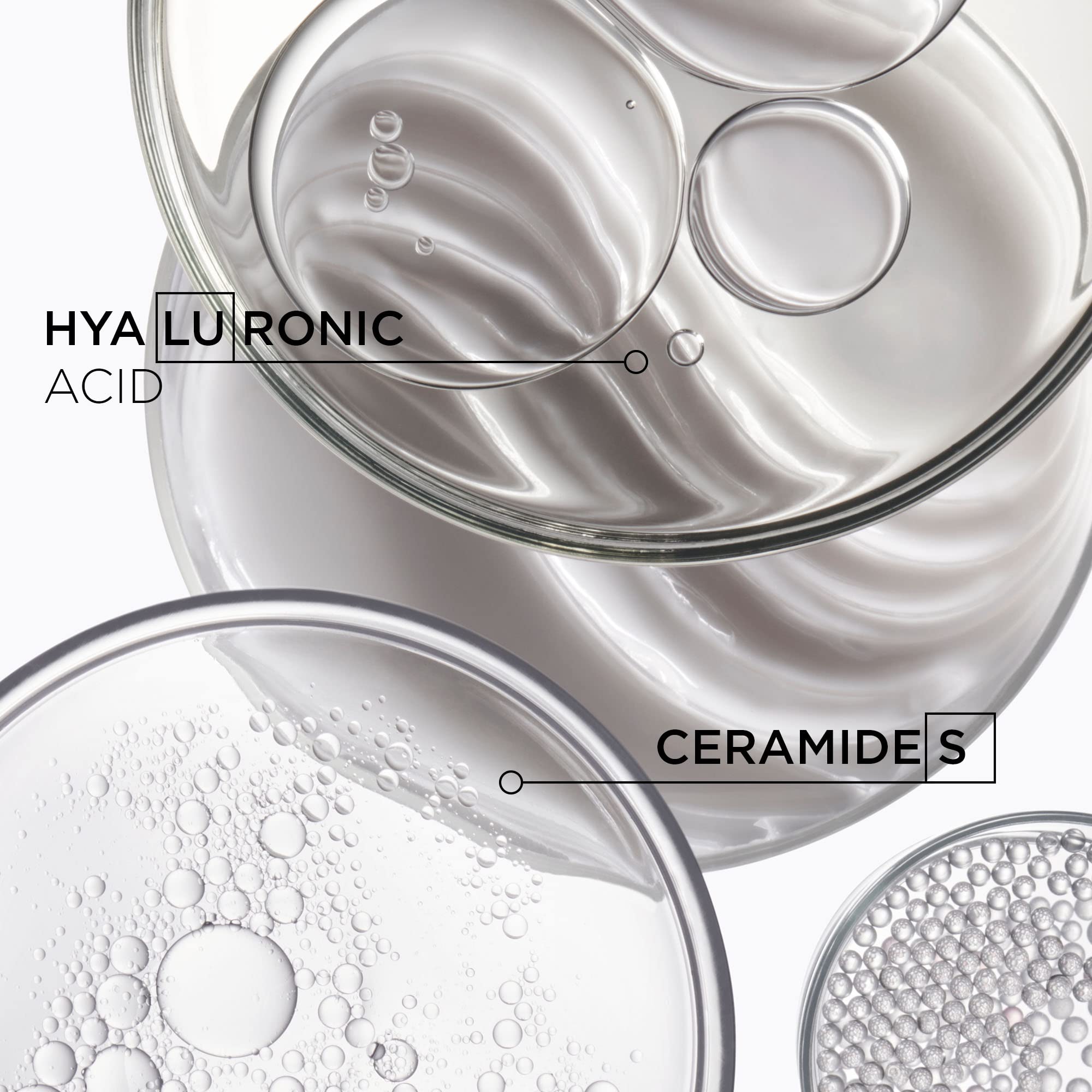 KÉRASTASE Densifique packaging close-up conveys luxe salon-grade care.