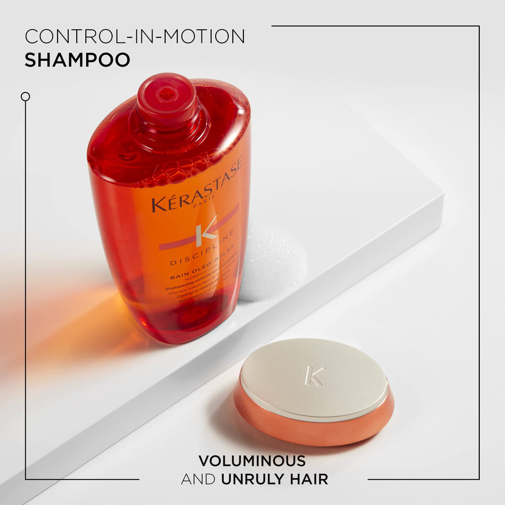 Kerastase Discipline Oleo-Relax shampoo foam spreads across hair for gentle cleansing