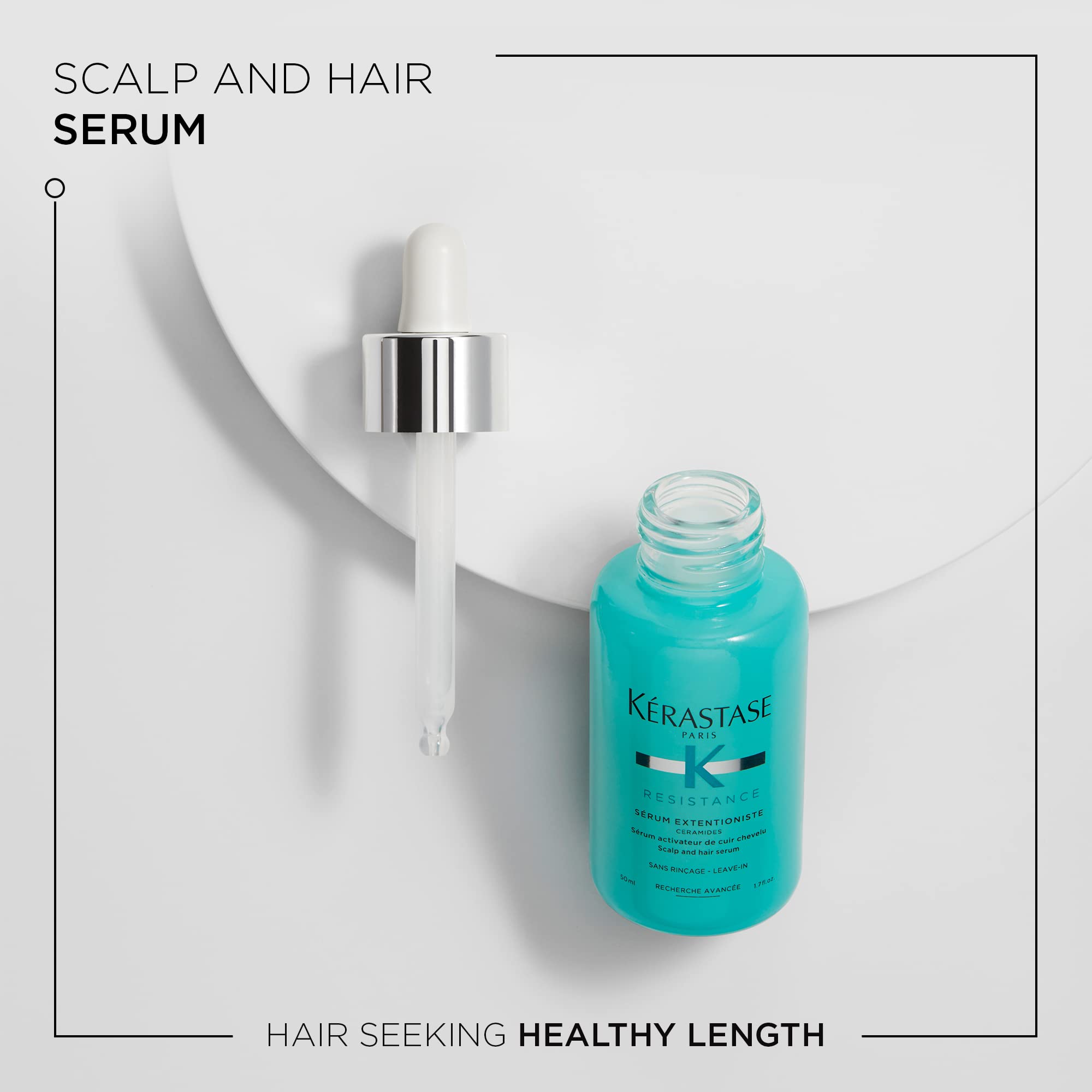 KÉRASTASE Extentioniste serum dropper ready for precise scalp application.