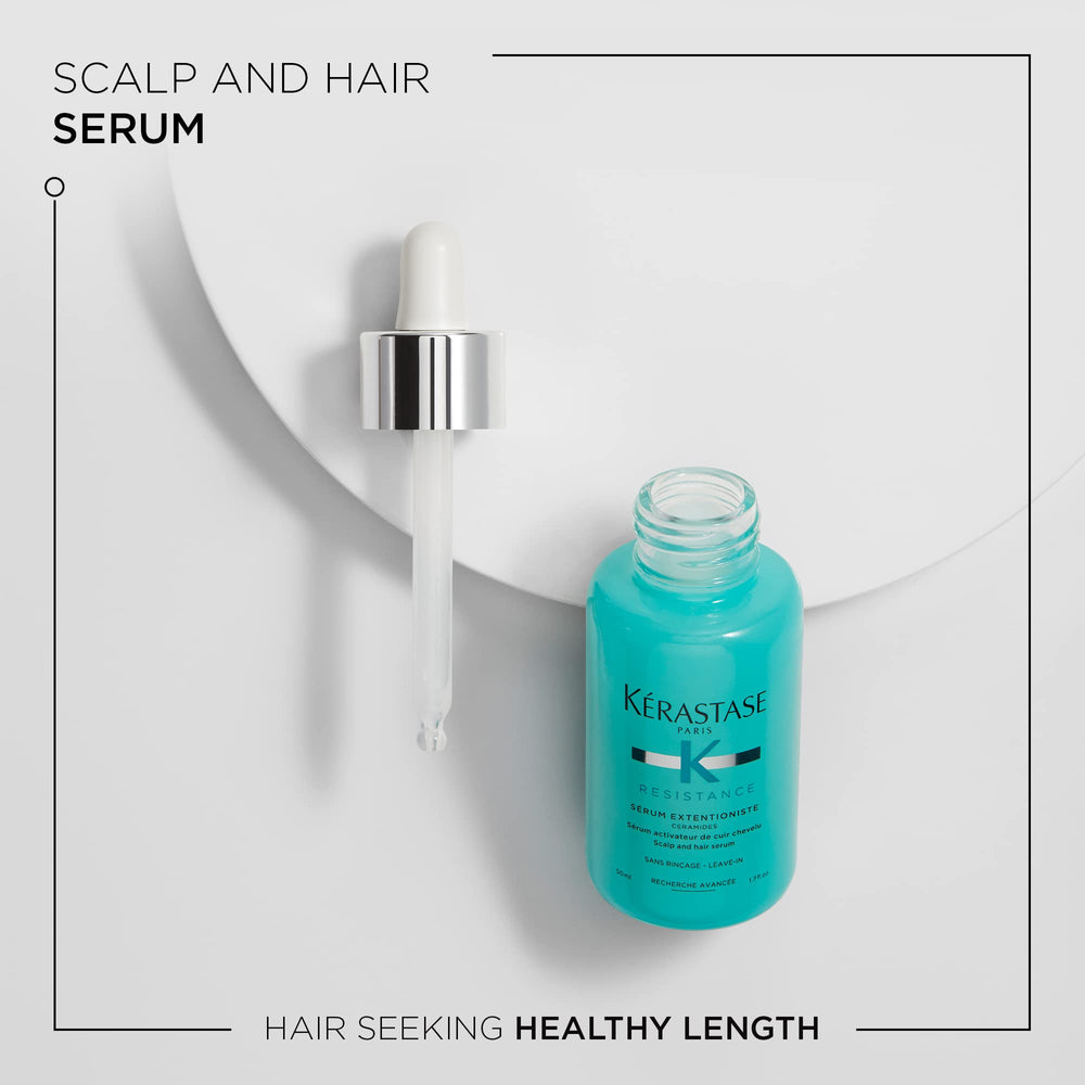 KÉRASTASE Extentioniste serum dropper ready for precise scalp application.