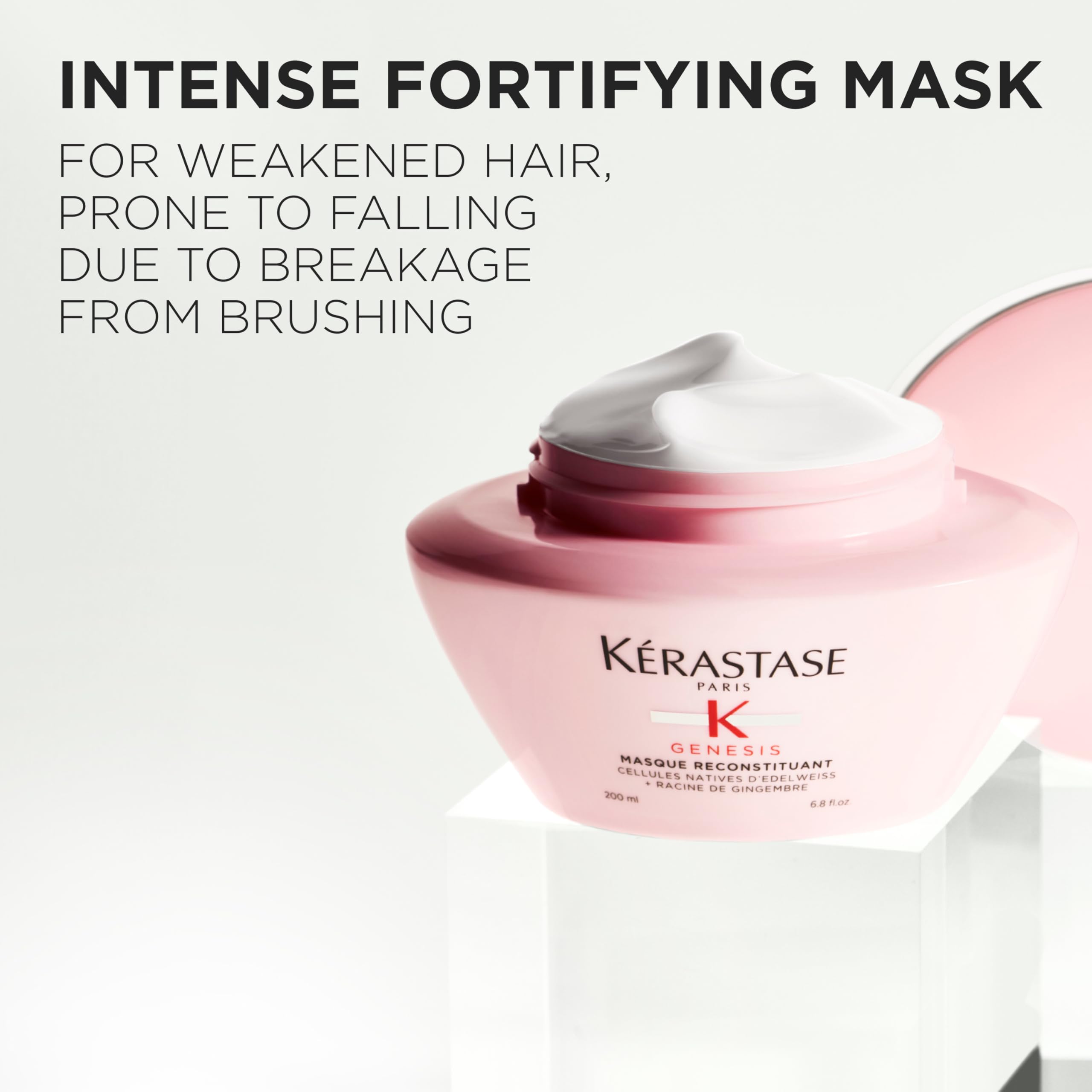 Genesis Hair Mask being massaged through lengths for smooth, conditioned hair.