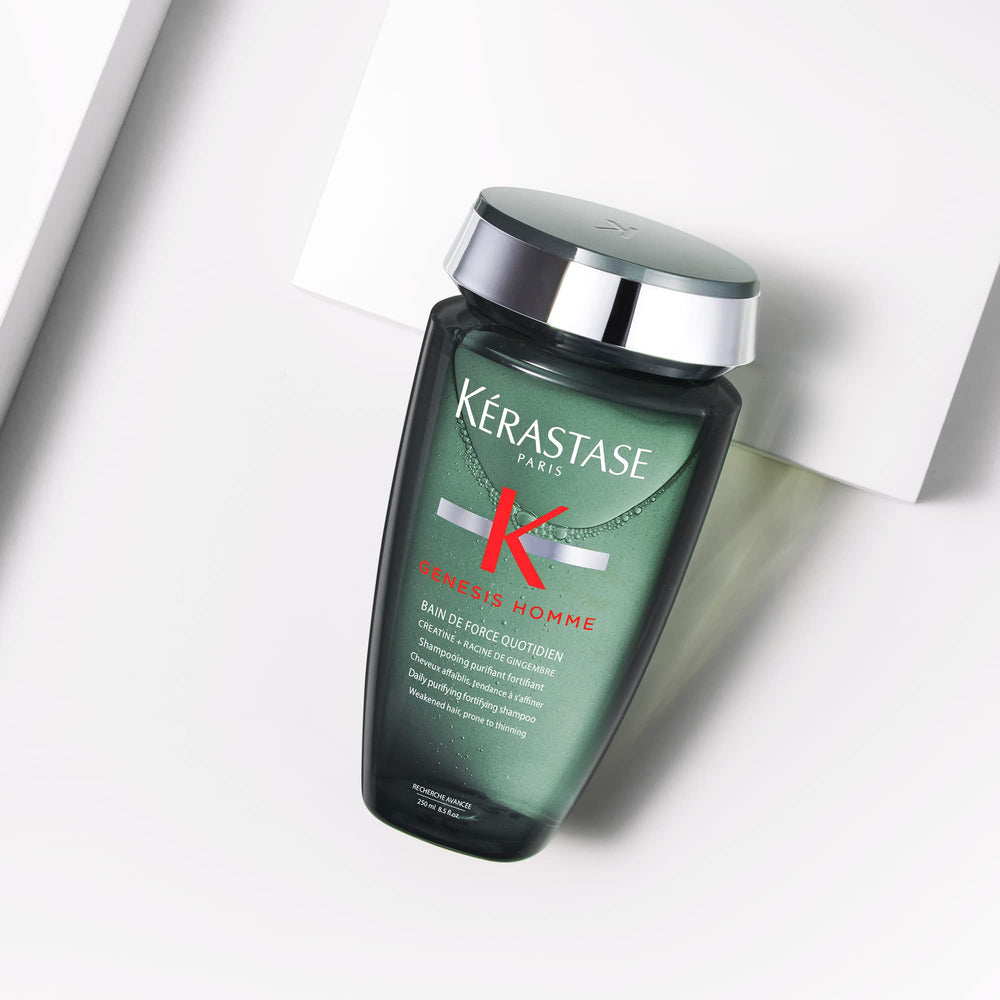 Kerastase Genesis Homme Bain De Force shampoo on a bathroom shelf