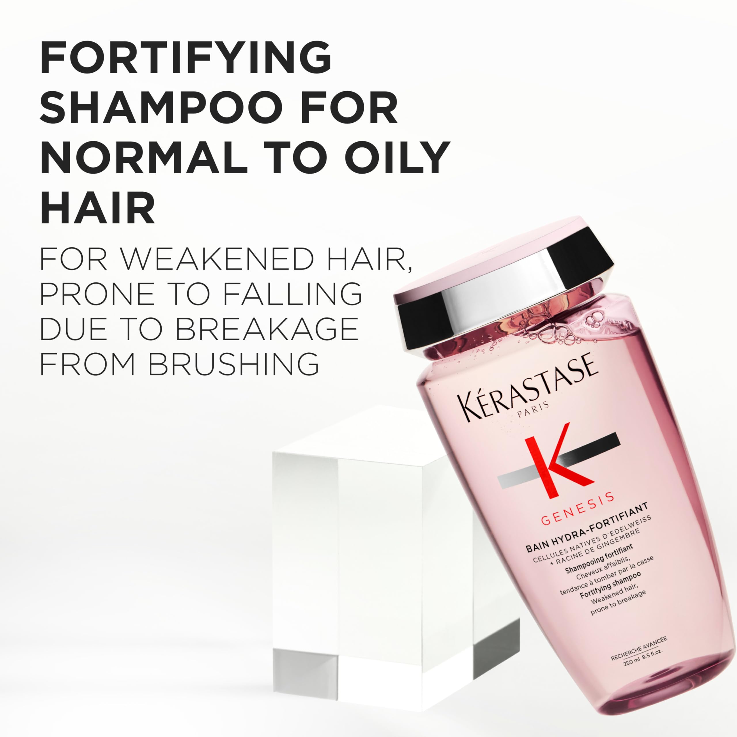 KÉRASTASE Genesis Hydra-Fortifiant shampoo bottle pour demonstrates easy, even application.