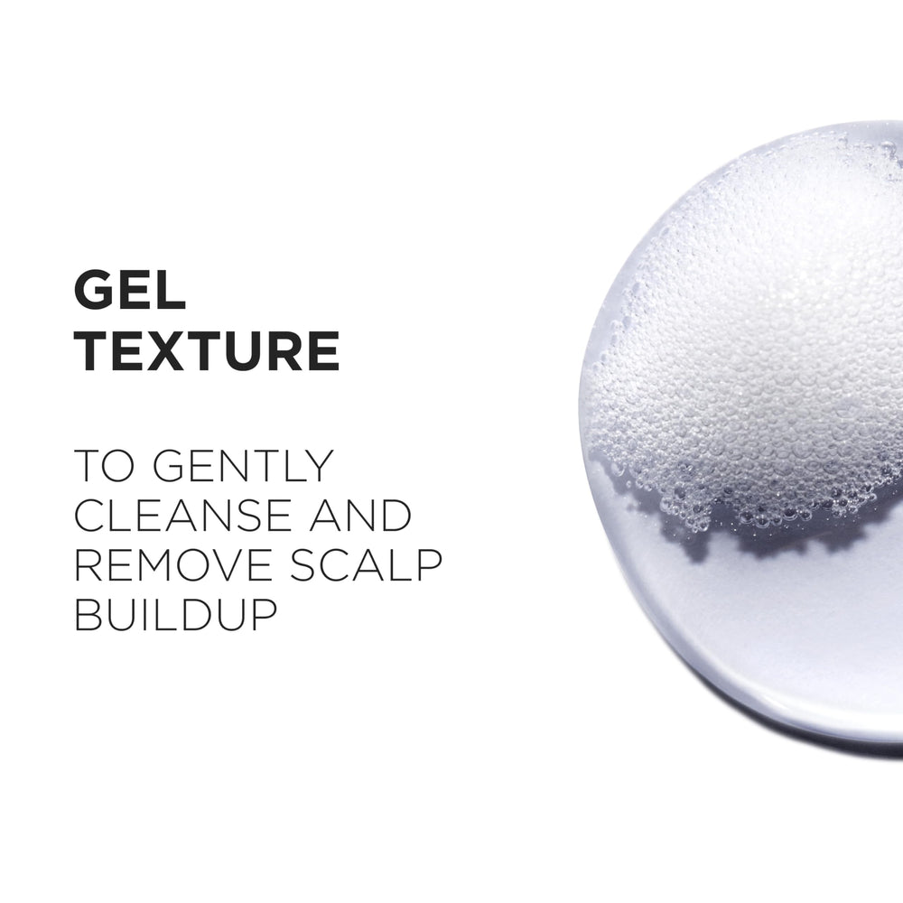 KÉRASTASE Genesis Hydra-Fortifiant shampoo hair close-up highlights detangling-friendly texture.