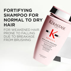 Close-up of Genesis Strengthening Shampoo label shows fortifying care for fragile hair.