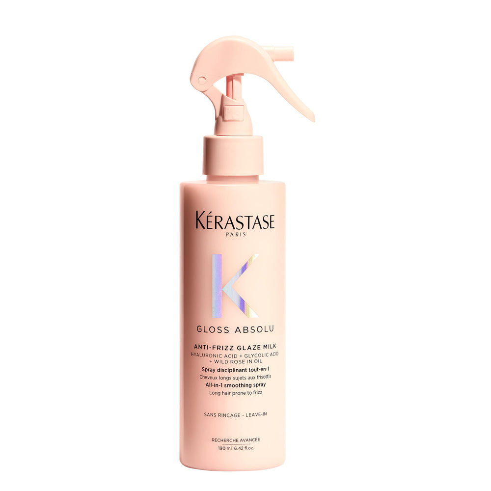 Kerastase Gloss Absolu Glaze Milk bottle demonstrates detangling for long hair.