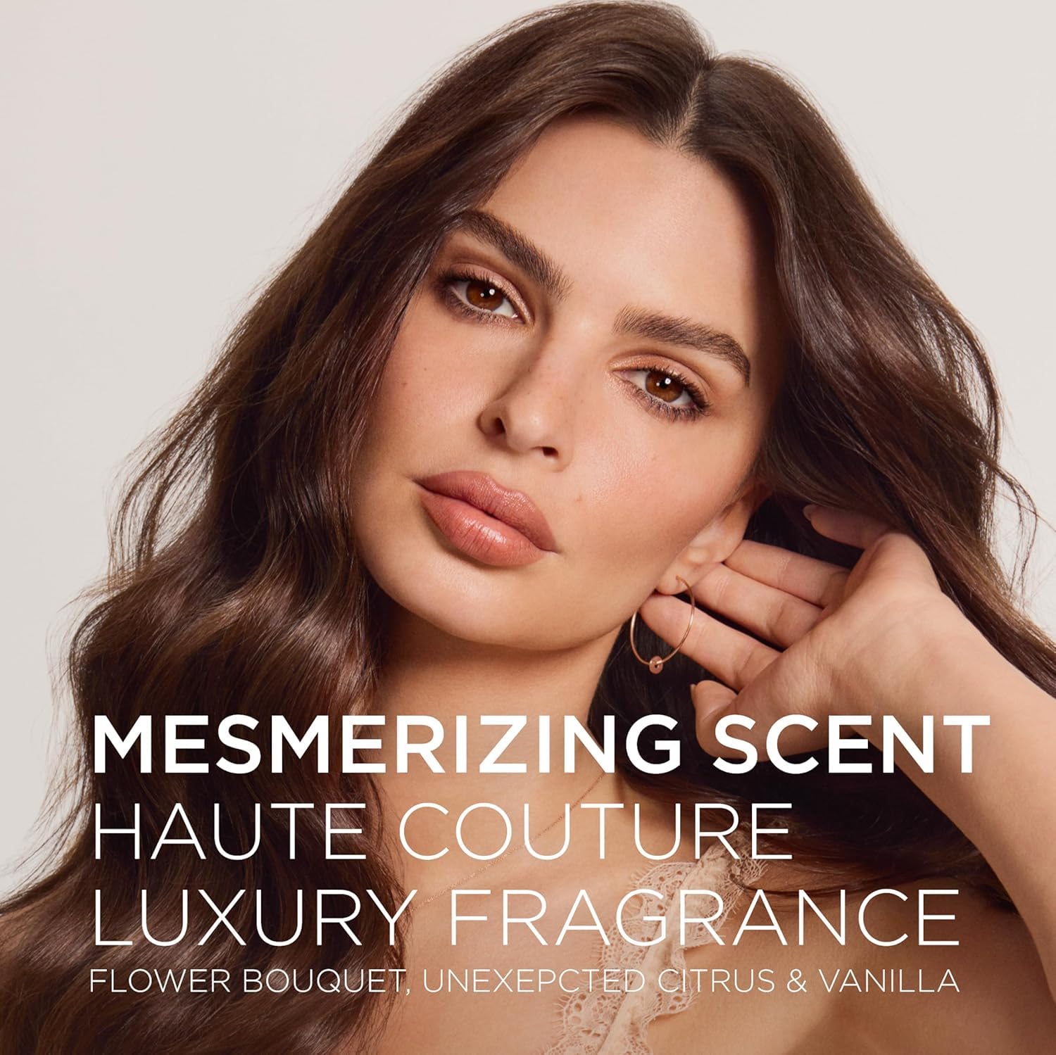 Kerastase Gloss Absolu Glaze Milk detangles and nourishes hair for smoothness.