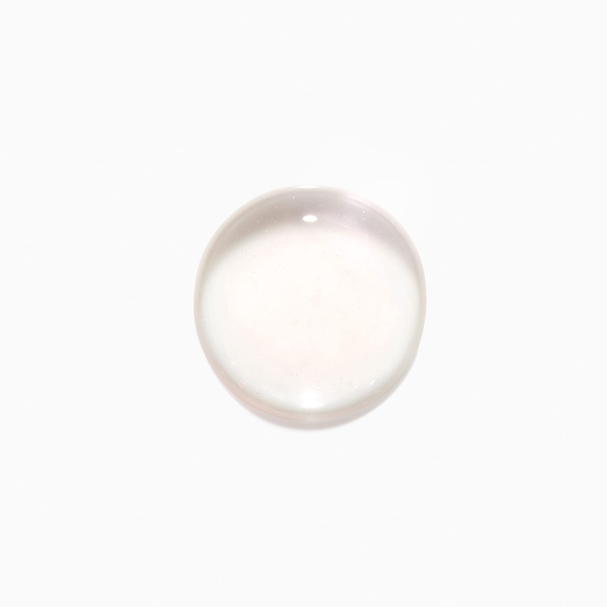 KÉRASTASE Initialiste label closeup emphasizing advanced scalp care