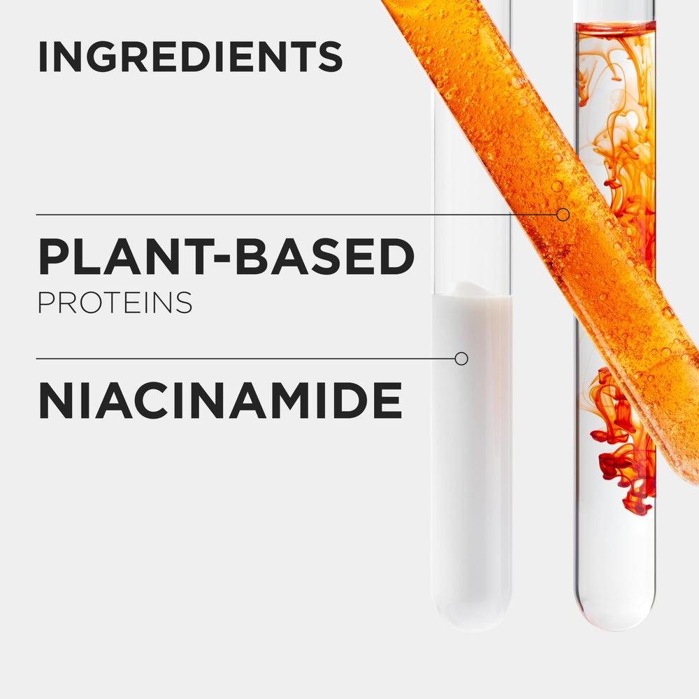 KÉRASTASE Nutritive 8H Night Serum close-up on glossy bottle label.
