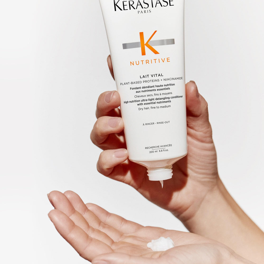 Kerastase Nutritive Lait Vital application bottle close up highlights detangling ease