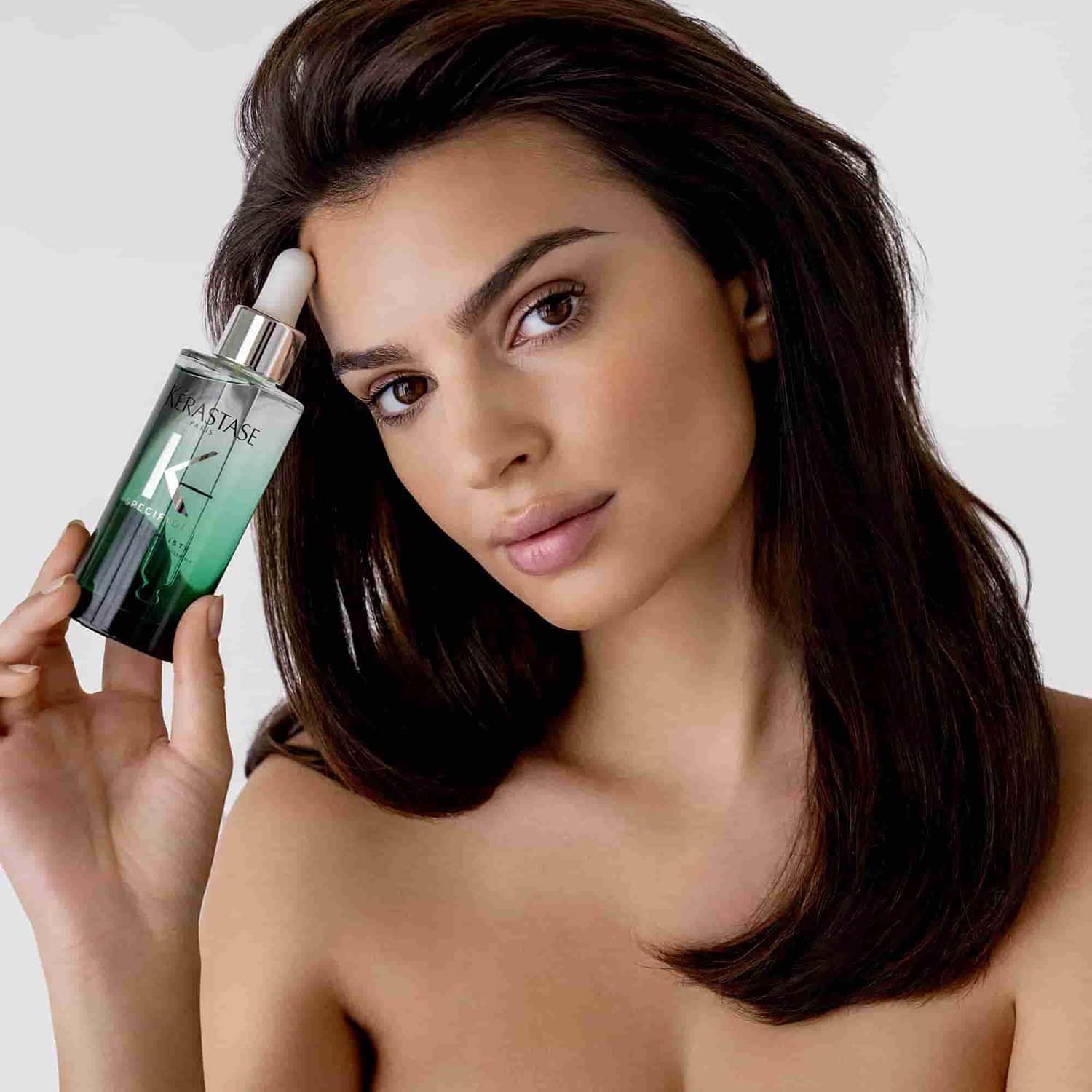Kerastase Potentialiste bottle on shelf ready for daily scalp care routine.