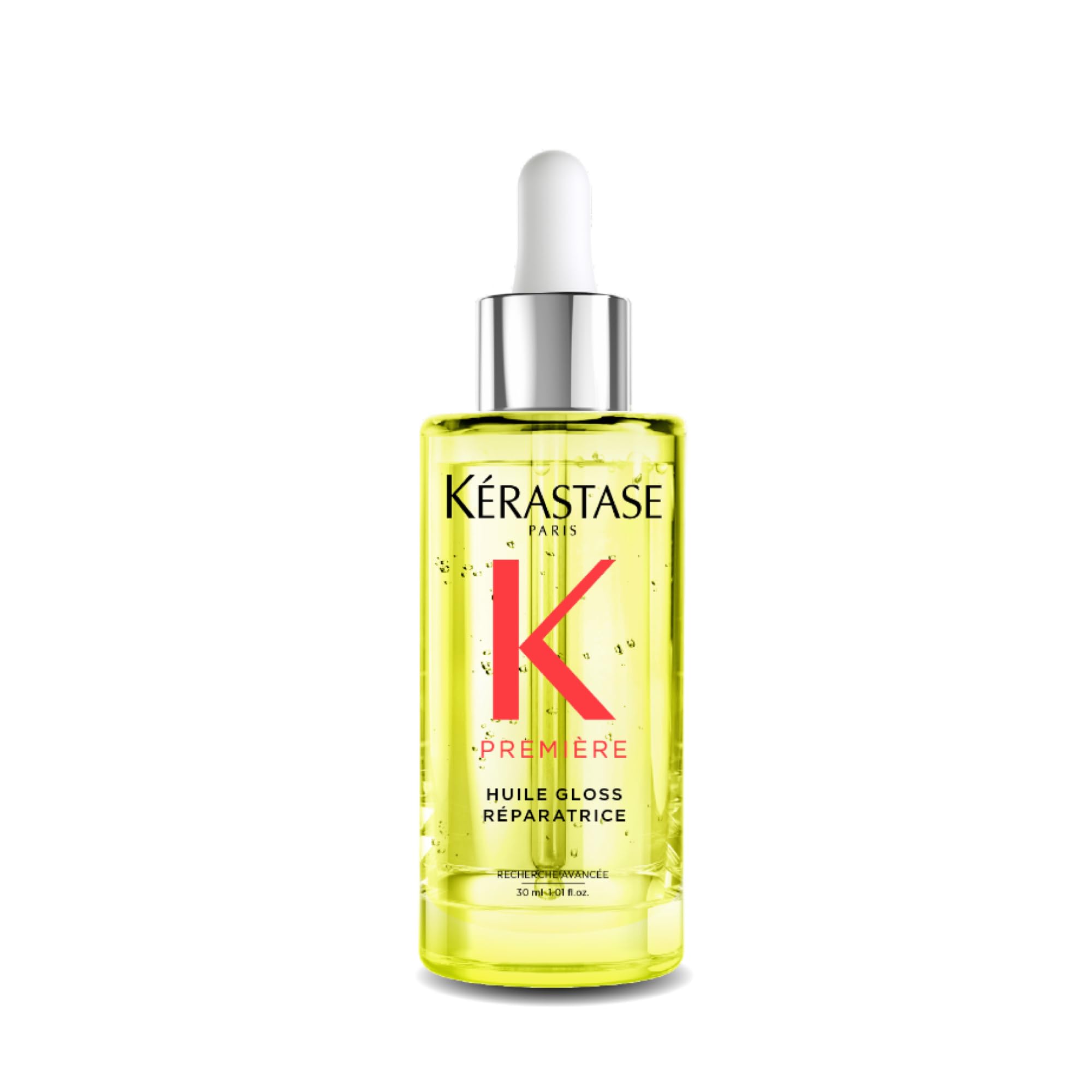 KÉRASTASE Première Repairing Gloss Oil bottle boosts shine and smoothness.