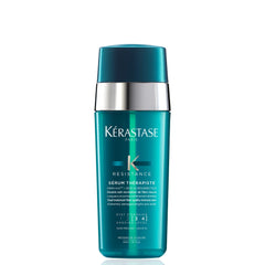 KÉRASTASE Resistance Serum Therapiste bottle close-up showing repair-ready hair
