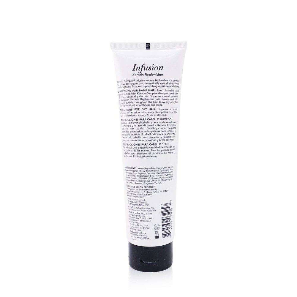 Keratin Complex Infusion Blow Dry Cream in use during heat styling for smooth results.