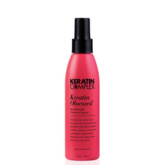 Keratin Complex Keratin Obsessed: vista frontal de la botella, facilita aplicación suave y control del frizz.