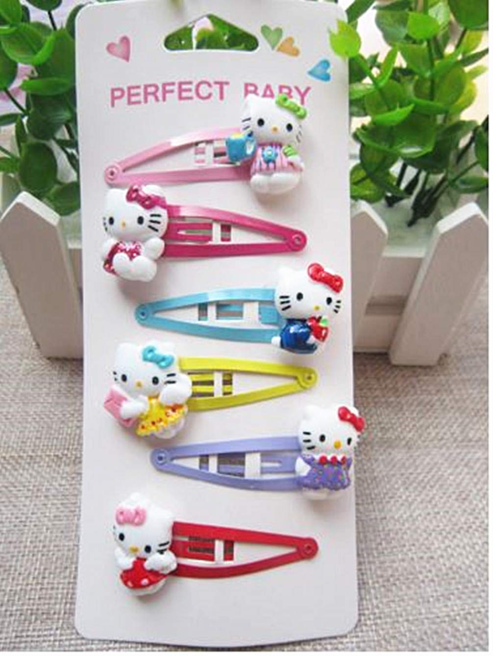 Kerr's Choice kitty hairpins sparkle with rhinestones for party moments.