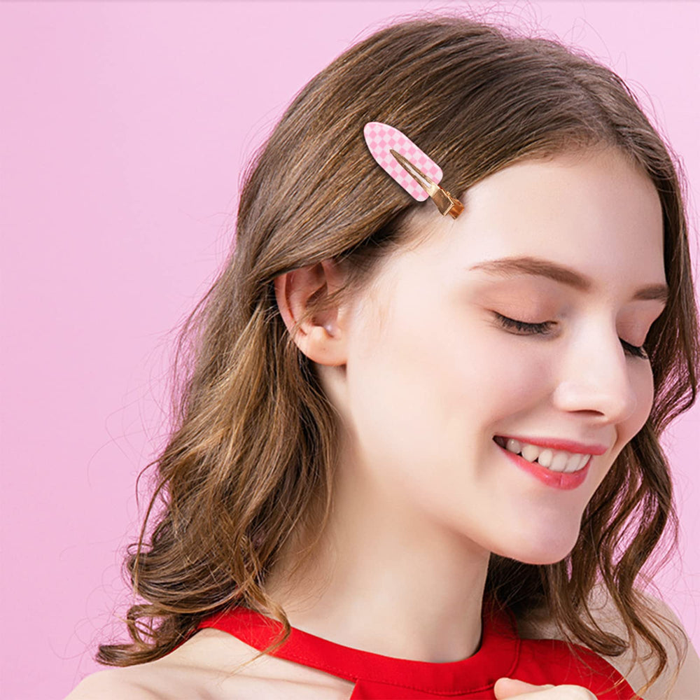 KesaPlan acrylic resin flat styling clips in bright checkerboard colors for makeup sessions.