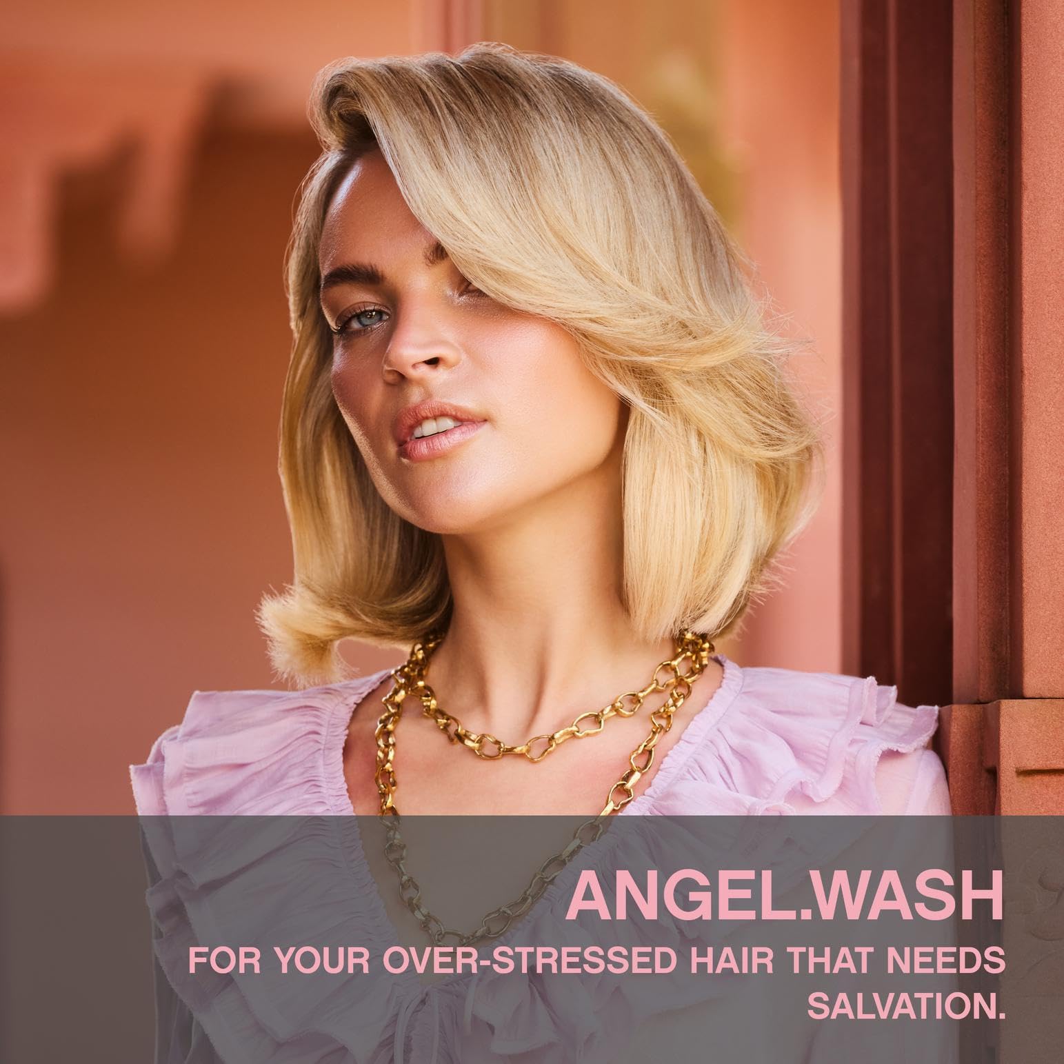 KEVIN.MURPHY Angel.Wash bottle label highlights nourishing antioxidants for color-treated hair.