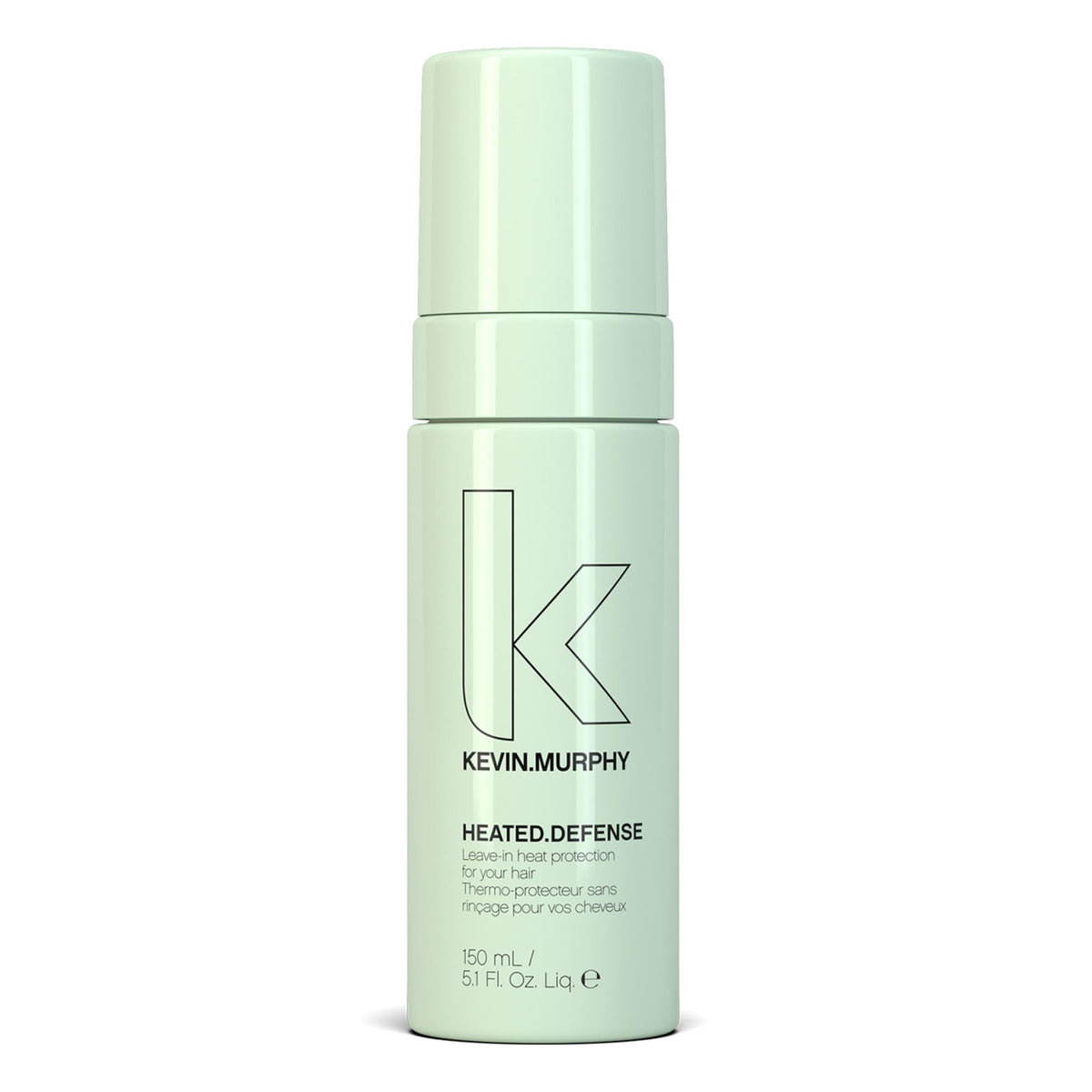 KEVIN.MURPHY HEATED.DEFENSE bottle closeup showing heat protection for all hair types.