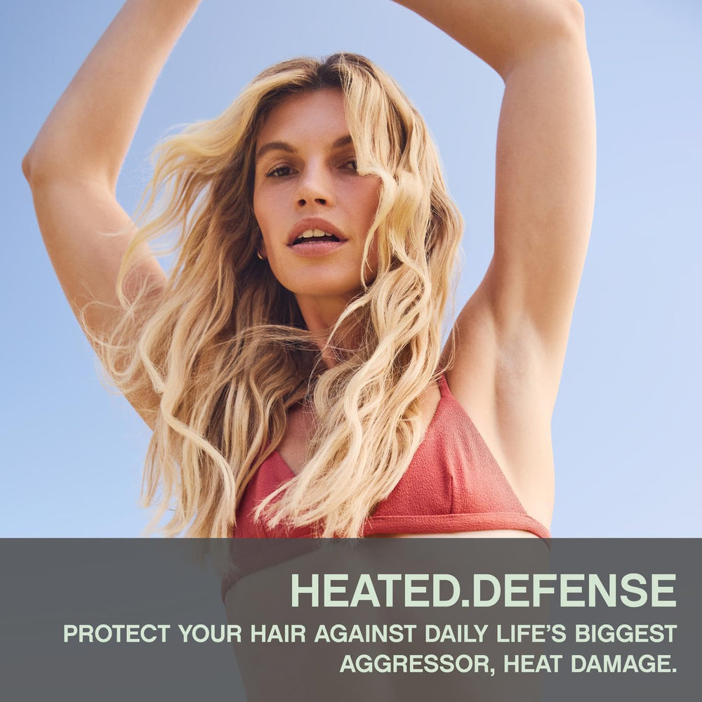 KEVIN.MURPHY HEATED.DEFENSE foam dispense during styling, lightweight detangler in action.