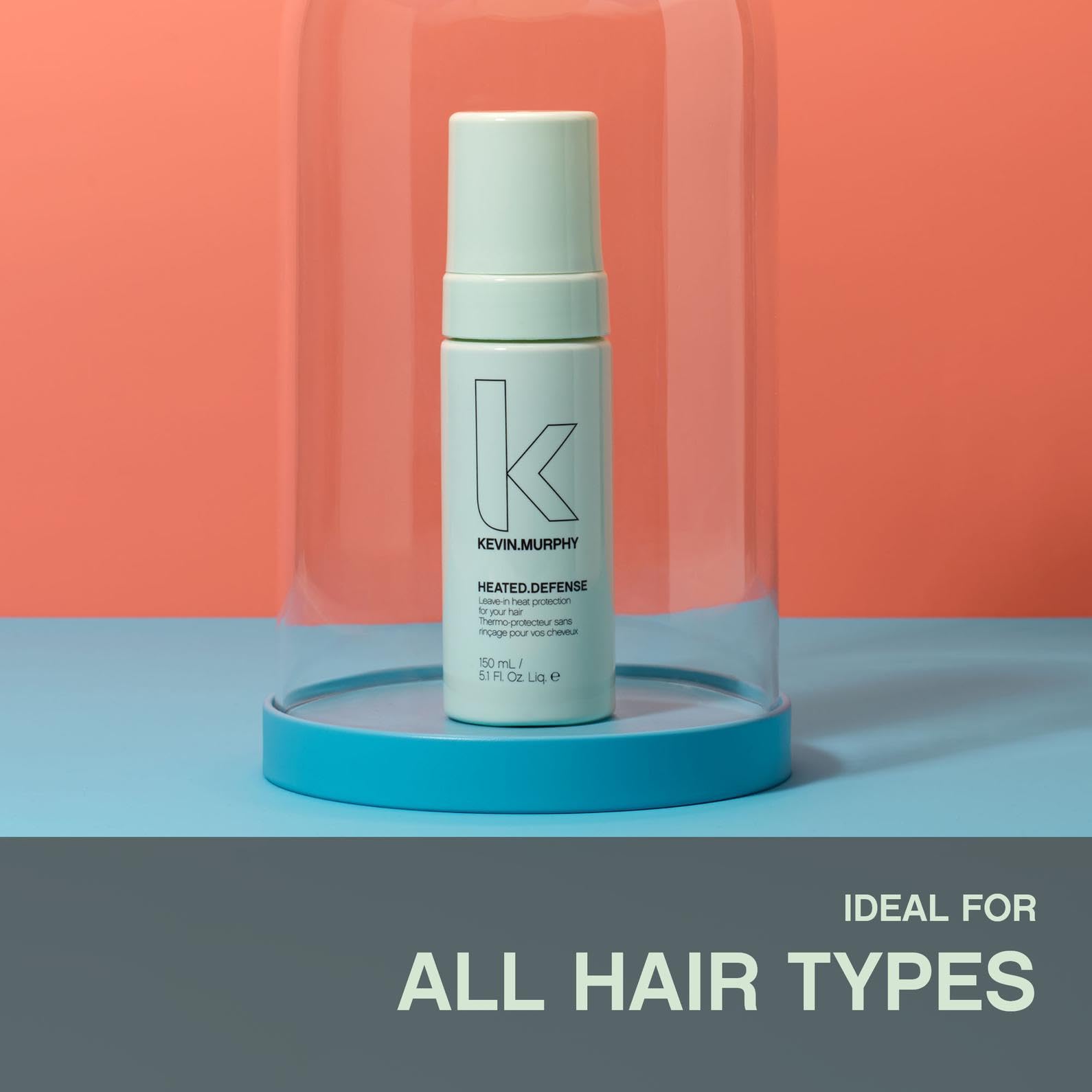 KEVIN.MURPHY HEATED.DEFENSE highlighting hydrolyzed quinoa ingredient for strength and smoothness.