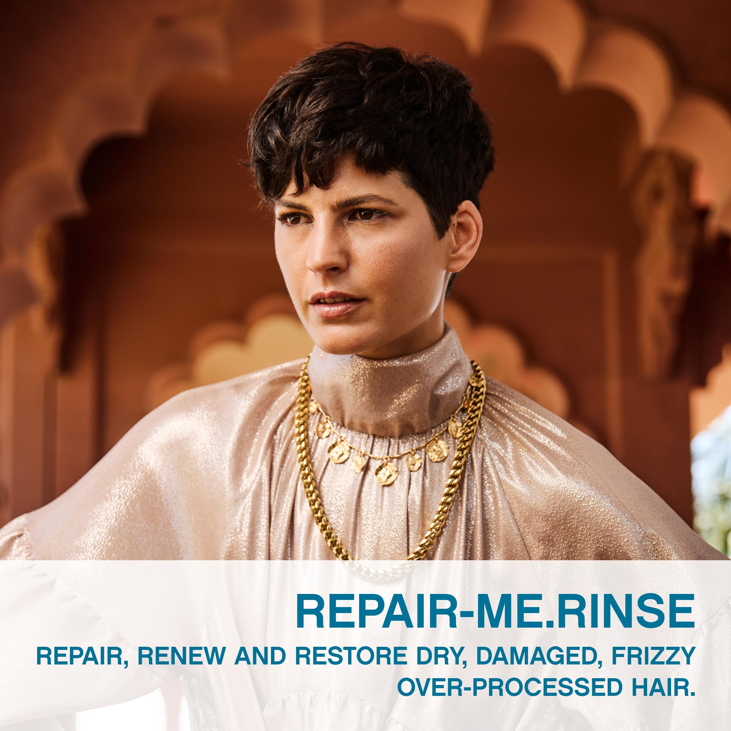 KEVIN.MURPHY REPAIR-ME.RINSE application close-up, smooths frizz for salon-like results