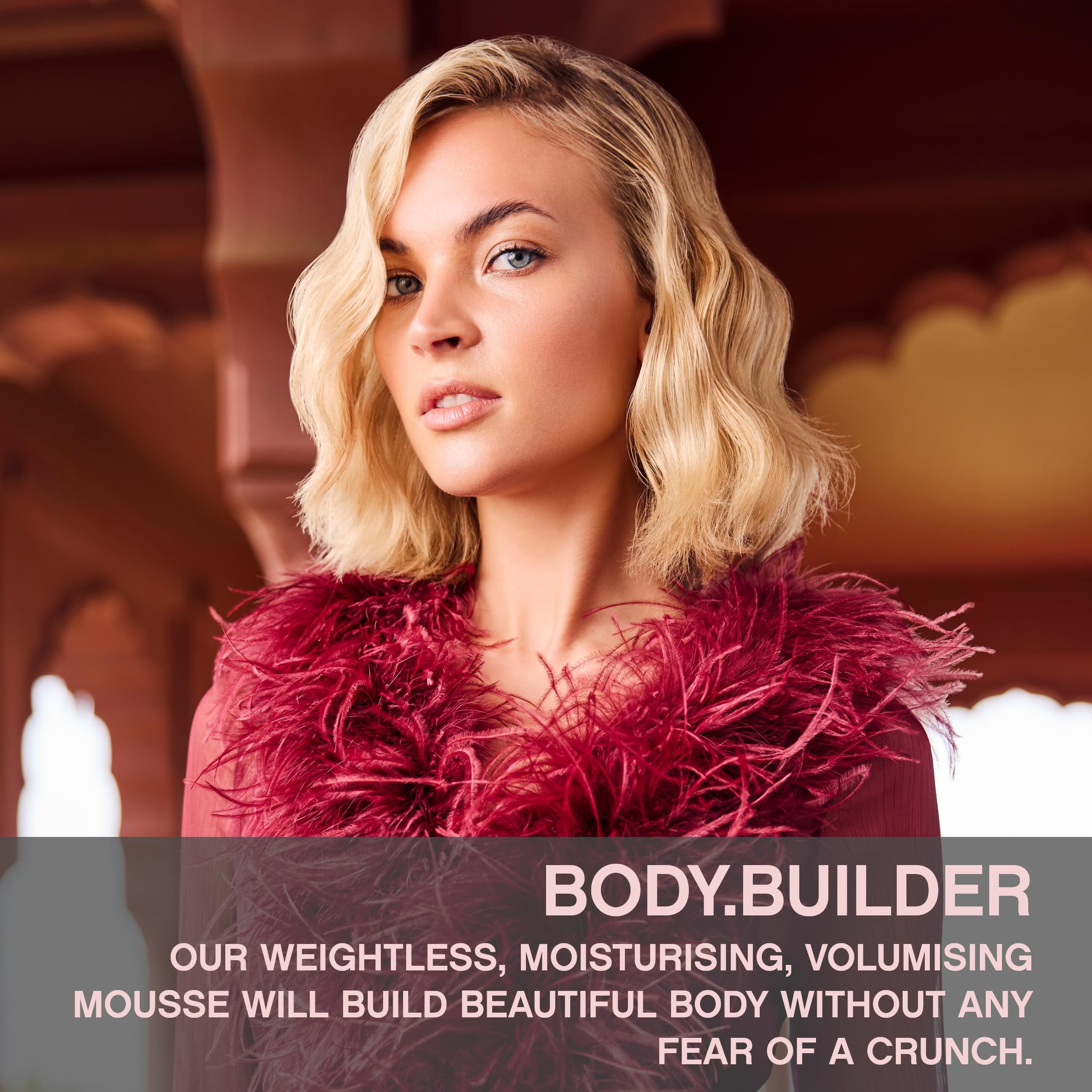 KEVIN.MURPHY BODY.BUILDER being applied to hair for even distribution and smooth texture