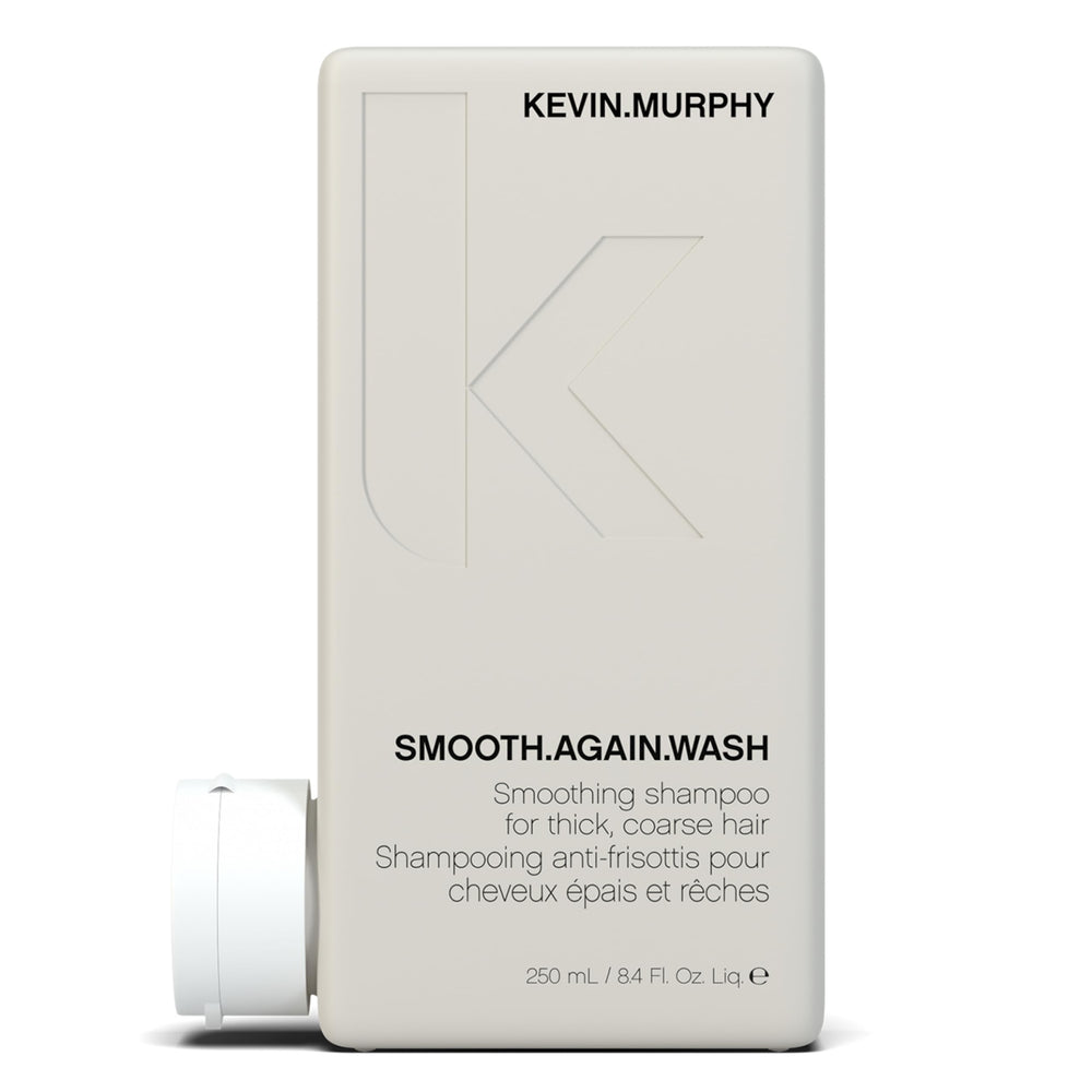 KEVIN.MURPHY SMOOTH.AGAIN.WASH bottle pour delivering frizz control and hydration.