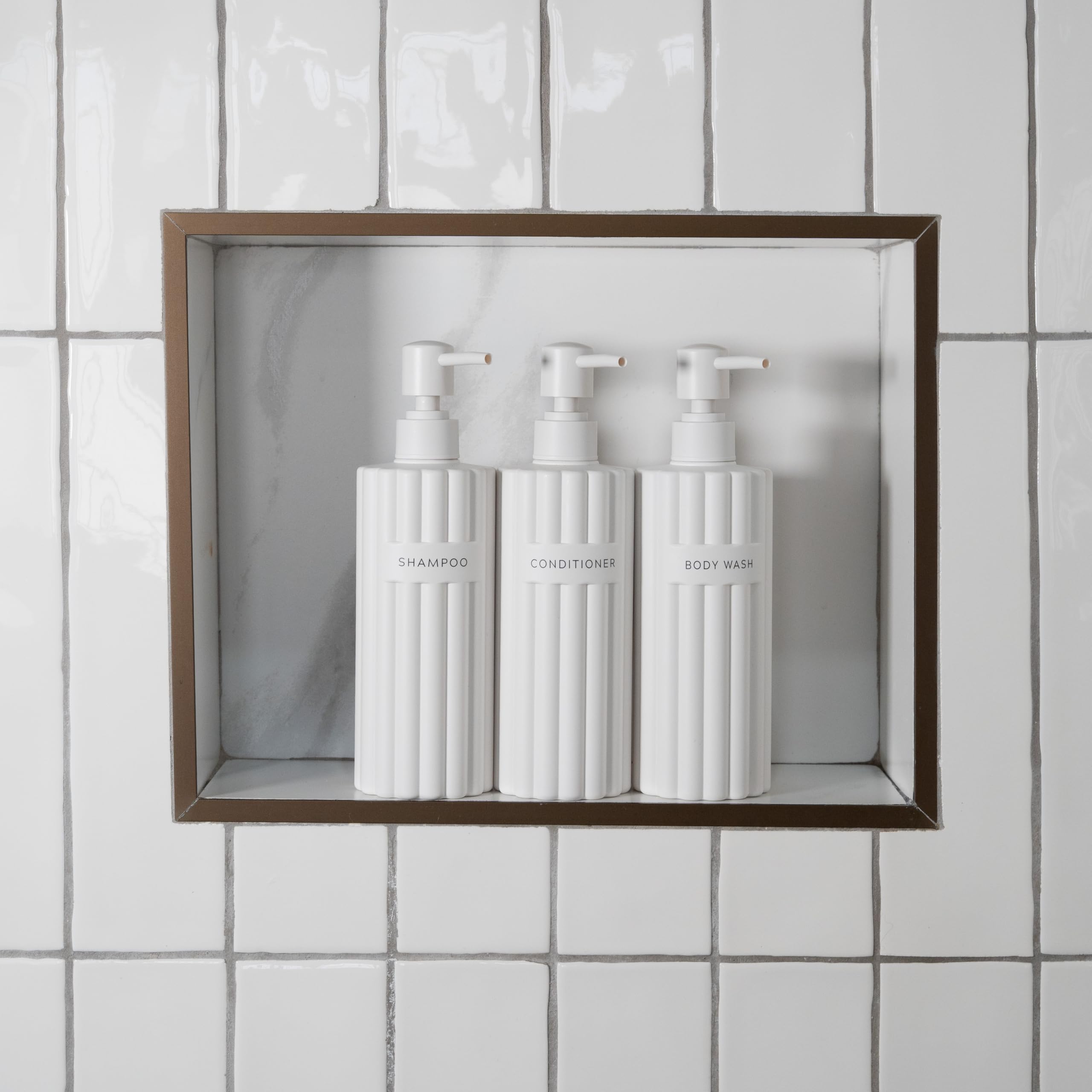 KIBAGA stylish conditioner dispenser 19oz with pump for mess-free storage.