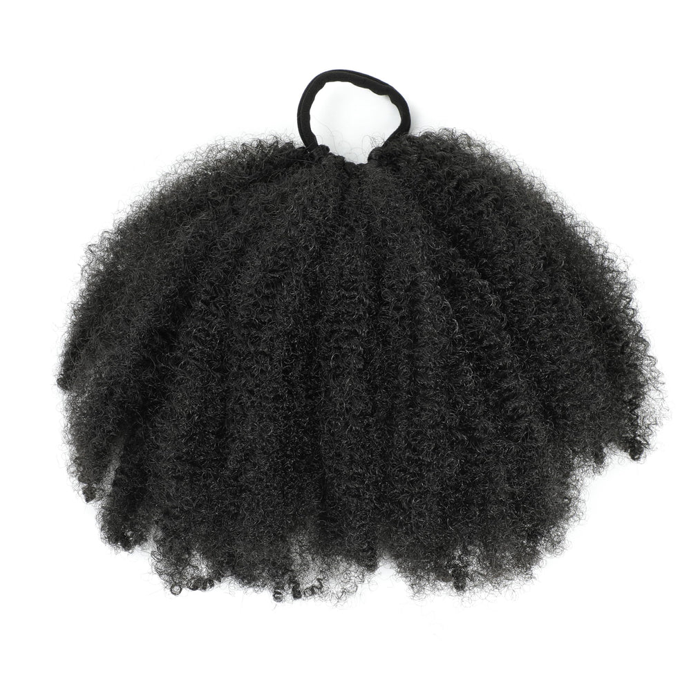 Kid's Summer Afro Puff Bun updo showcases quick protective styling and natural blend.