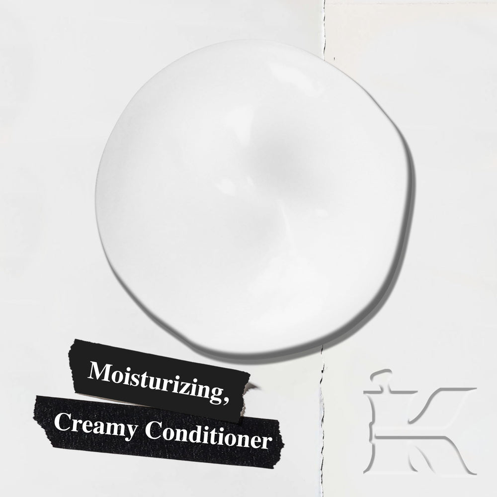 Kiehl's Amino Acid Conditioner bottle close-up, creamy texture for detangling.