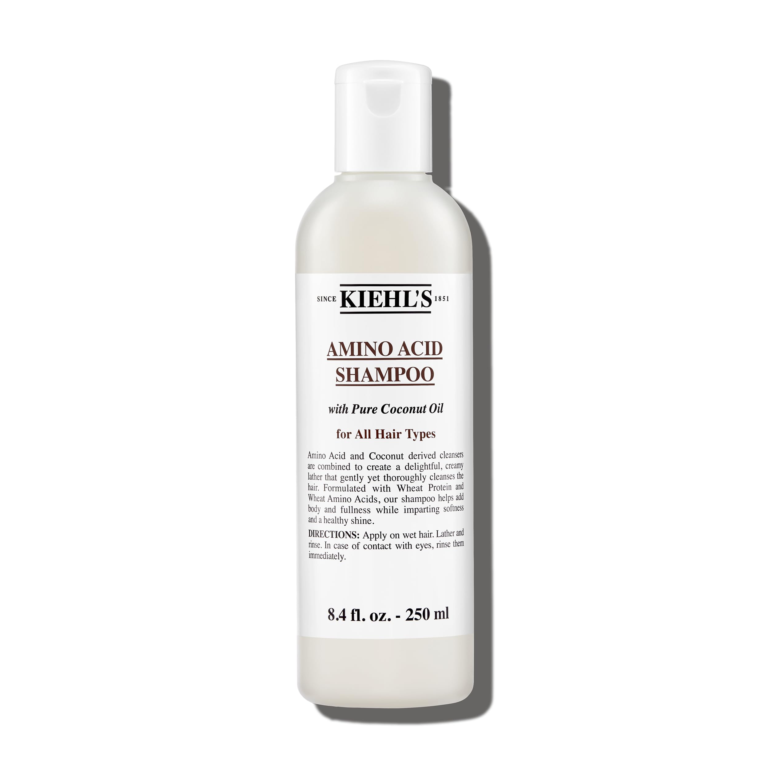 Kiehl's Amino Acid Shampoo bottle pour for gentle daily cleansing on all hair types