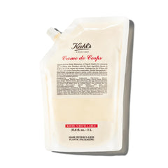 Kiehl's Creme de Corps Rich bottle pouring shows fast-absorbing hydration