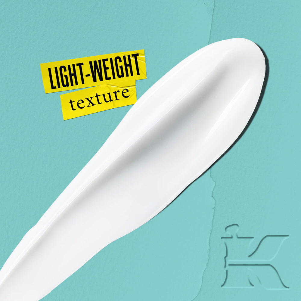 Kiehl's Expertly Clear Moisturizer on hand shows hydrating texture suitable for acne-prone skin.