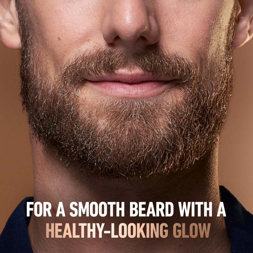 Beard oil bottle shot featuring avocado macadamia mix moisturizes dry skin.