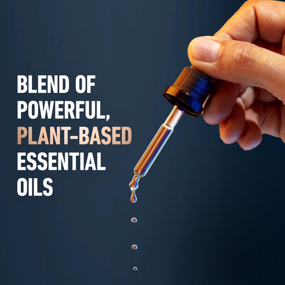 Citrus-wood fragrance close-up conveys bergamot and cedarwood notes.