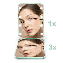 Kintion cyan pocket mirror tucked into a purse for on-the-go use