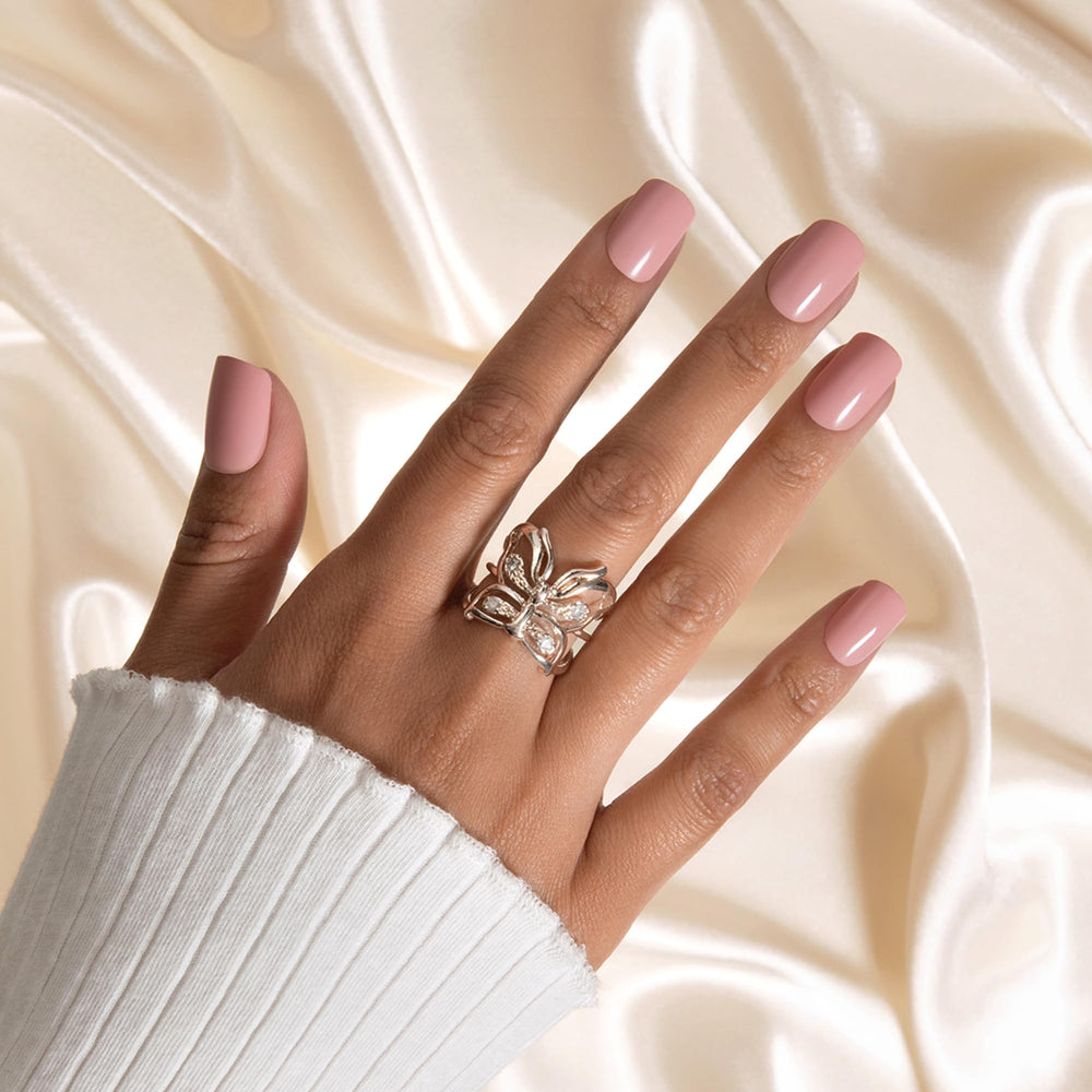 KISS Gel Fantasy ribbons pink nails—mini file included for easy shaping and buffing.
