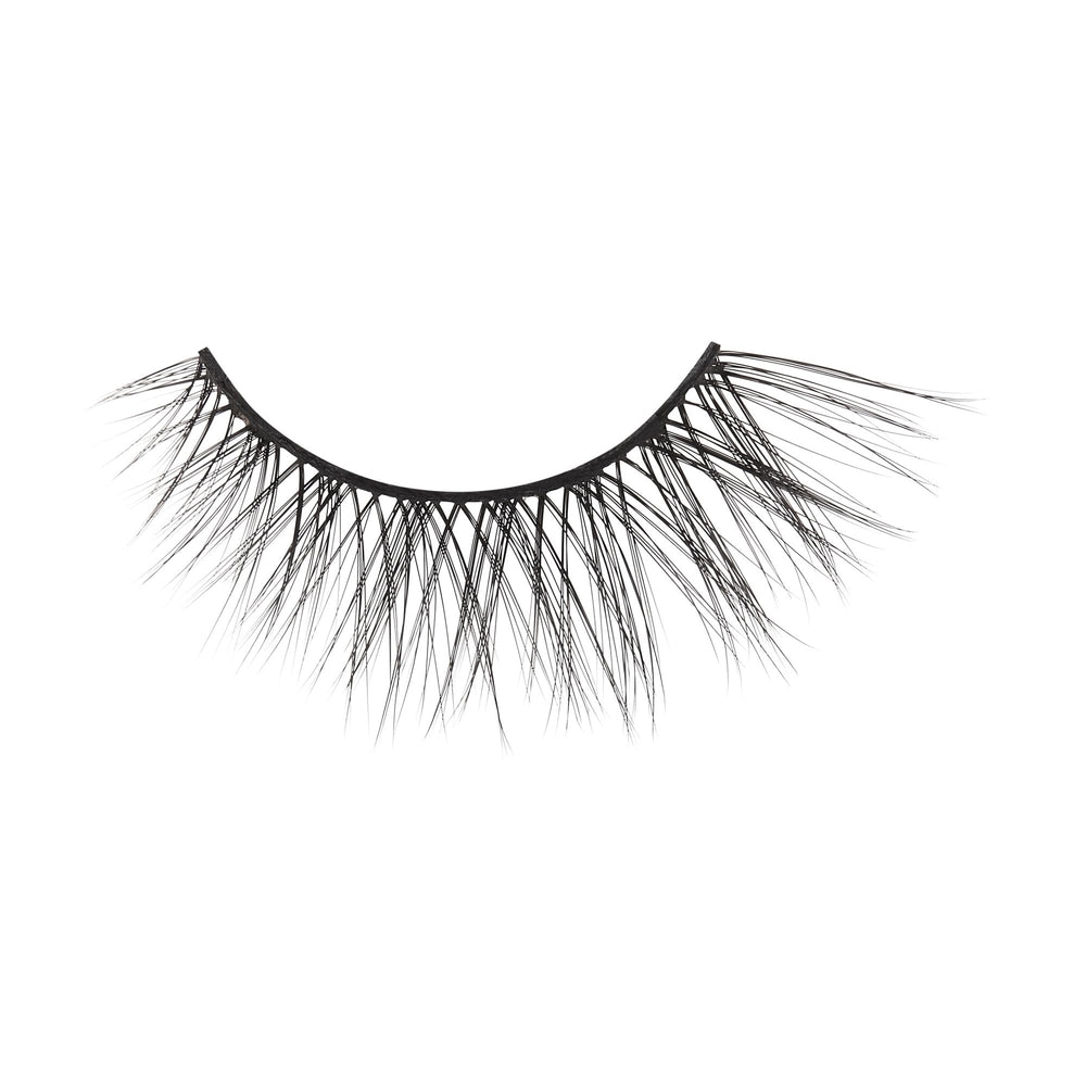 KISS Charm biotin-infused formula supports lash-friendly wear.