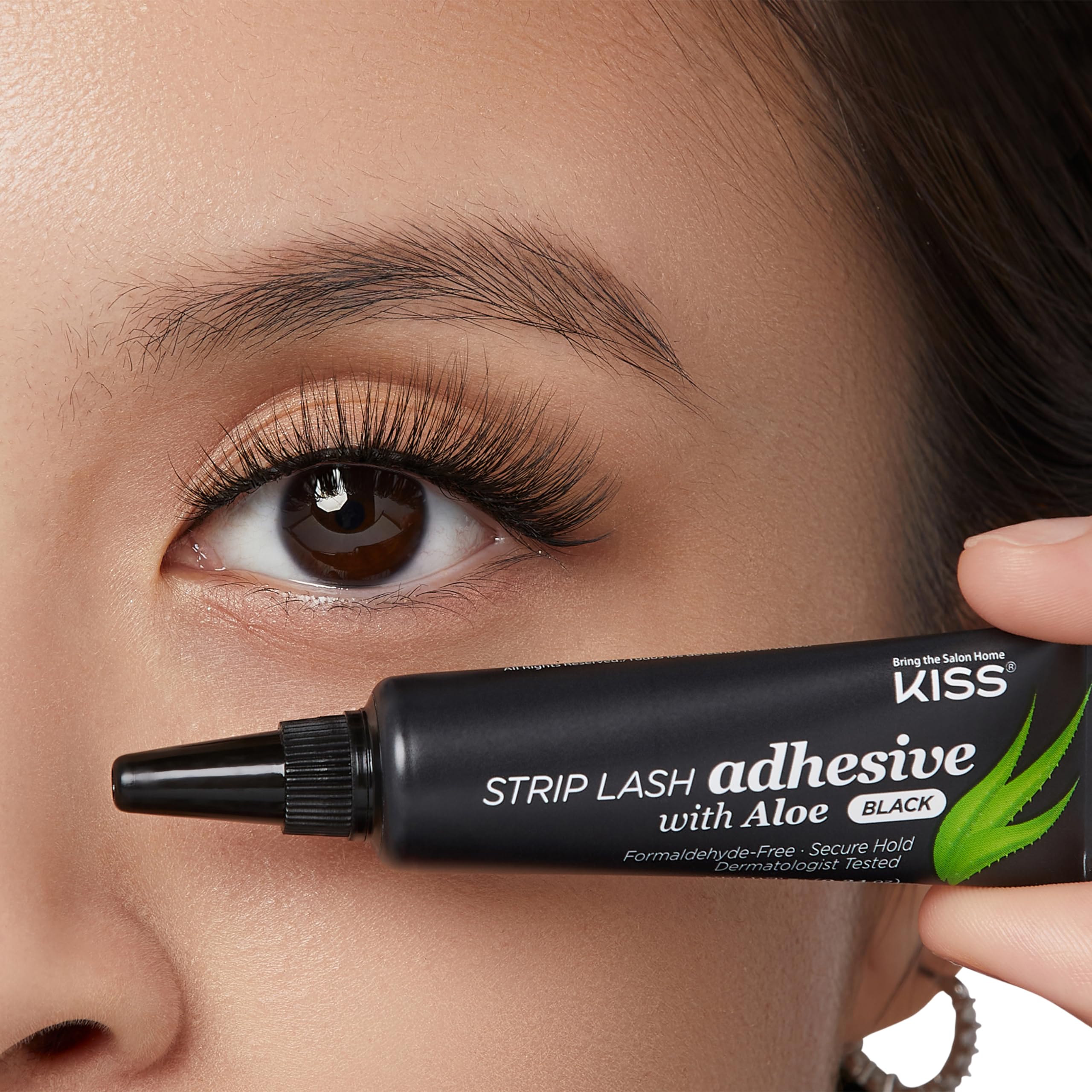 KISS secure-hold lash glue demonstrated for all-day wear