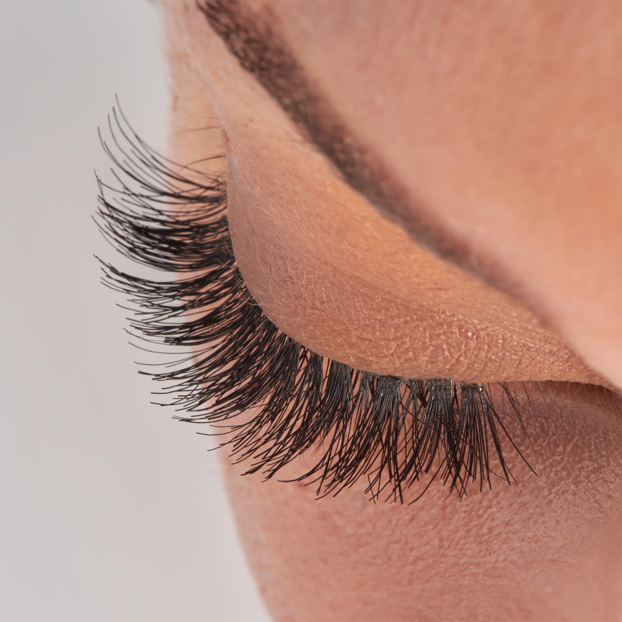 KISS signature wispy effect enhances eyes with a soft, natural vibe.