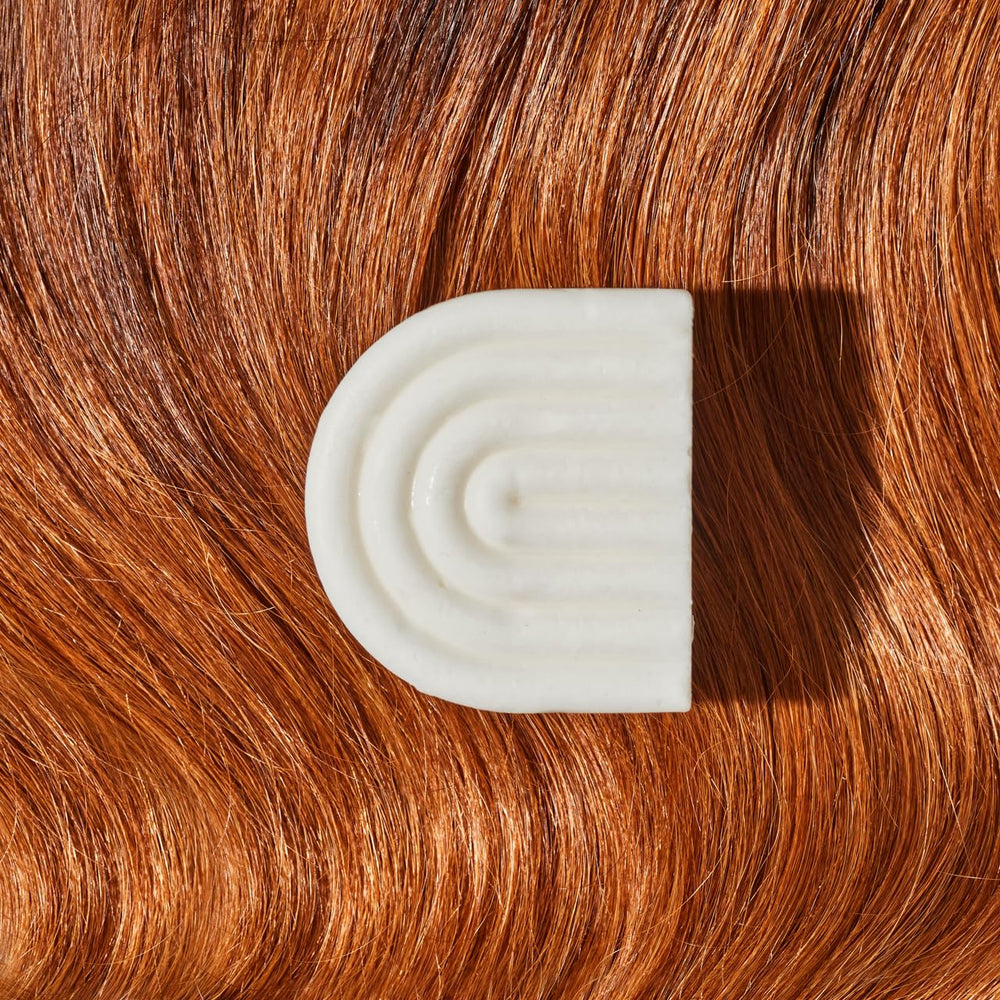 Kitsch barra 2 en 1 cuida cuerpo y cabello con suavidad.